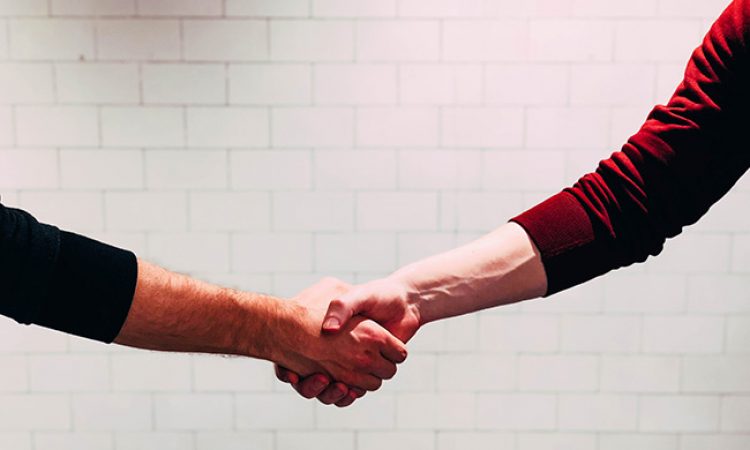 The Power of a Good Old Fashioned Warm Handshake in Real Estate